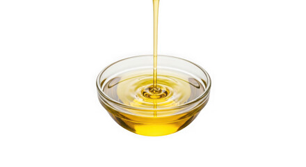 Golden liquid pouring into a small glass bowl isolated on white background transparent background