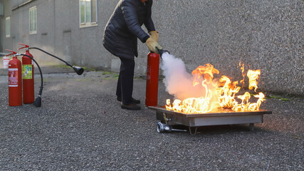 corporate safety - exercise during a firefighting course © Bookaroo68