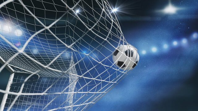  Soccer ball in soccer goal net in a big stadium isolated on big soccer stadium. soccer net.