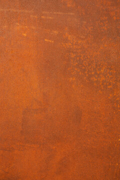 Rusting metal surface showing textured abstract background