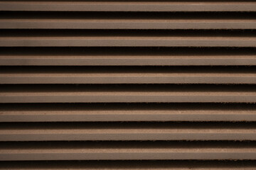 Obraz premium Brown wooden grill pattern creating a textured background