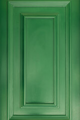 Green painted wooden door panel architectural texture