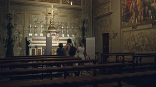 Blurred church interior with shallow bokeh focusing on altar and pews; background backplate copyspace calm.
