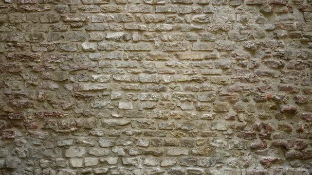 Aged stone and brick wall texture with sharp detail, neutral tones, building; template overlay virtual calm.