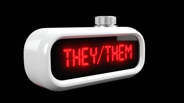 A sleek, white minimalist electronic device features a glowing red LED screen displaying "THEY/ THEM" pronouns against a solid black background.