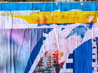 Old grunge ripped, torn vintage posters creased crumpled paper surface texture background