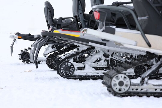 Snow-covered snowmobile tracks. High quality photo