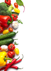 Fresh organic vegetables and spices creating a border