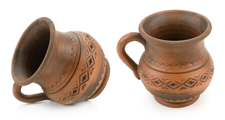 Vintage Pottery Jugs with Geometric Etchings and Decorative Dishes in Studio Shot