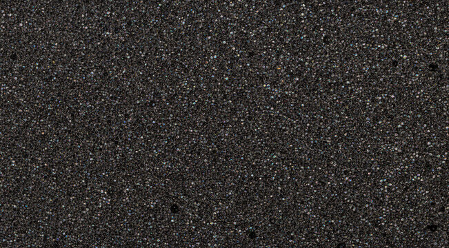 Black foam material showing porous detailed surface texture