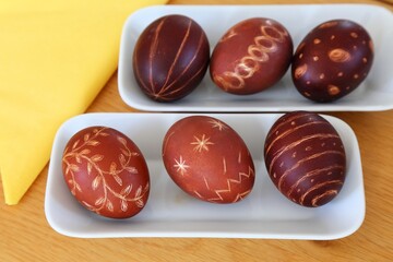 Polish Easter tradition. Pisanki eggs dyed with onion shells with scratched patterns.