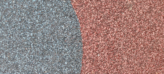 Suelo de caucho reciclado para parques infantiles en colores gris y rojo © Gabrieuskal