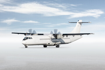 White passenger turboprop plane isolated on bright background with sky