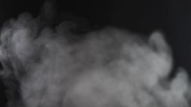 Steam, smoke, vapor isolated on black background. Smoke steam spray, abstract vaporing water, texture of cold mist, hot vapor, fog effect closeup, black screen.  