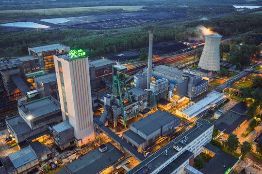 Aerial view of the CSM Sever black coal mine in Stonava, owned by OKD, in the morning, featuring its iconic infrastructure.
