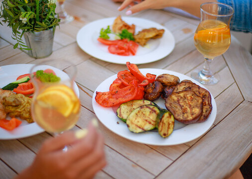 Refreshing Drink and Delicious Food at an Outdoor Cafe