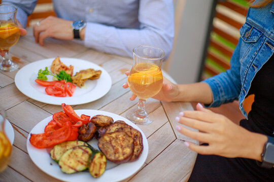 Refreshing Drink and Delicious Food at an Outdoor Cafe