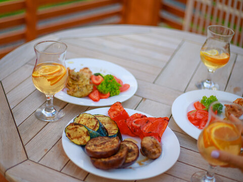 Refreshing Drink and Delicious Food at an Outdoor Cafe