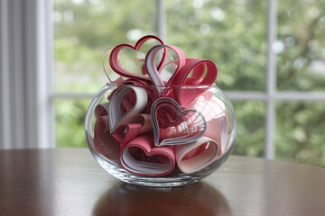Heart-Shaped Ribbons in Glass Vase Soft Romantic Red and White Natural Light Centerpiece for Valentines Day Decoration