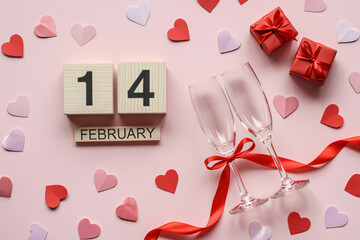 Valentines Day Celebration with Champagne Flutes and Gifts in Romantic Red and Pink Colors on Soft Pastel Background for Love and Anniversary