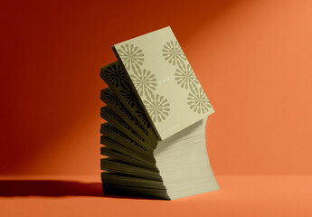 Leaning Stack of Business Cards with Top Card Displayed