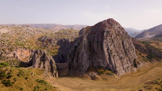 Aerial view of Montejaque dam and massive limestone cliffs in Ronda mountains
