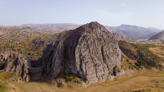 Aerial view of Montejaque dam and massive limestone cliffs in Ronda mountains
