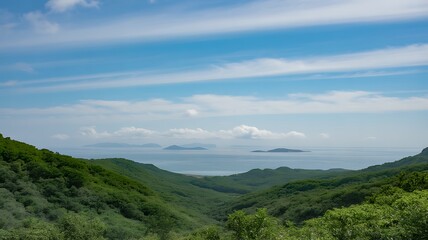 Obraz premium Coastal Green Hills Overlooking Ocean & Distant Islands â€“ Idyllic Seascape Panorama