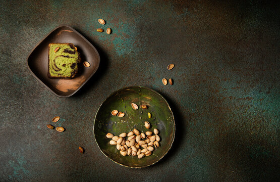 Pistachio cake slice with pistachio 
