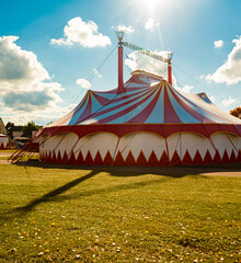Autumn or indian summer view with a red and white circus tent at Wallersdorf, Dingolfing, Landau, Bavaria, Germany © Martin Erdniss