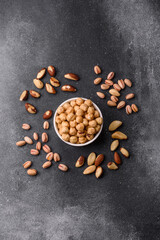 Whole peeled hazelnuts, roasted or raw, as an ingredient for healthy food. Hazelnuts as a background