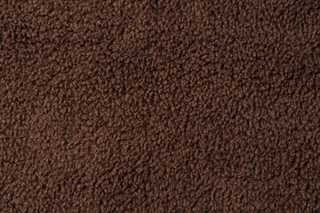 Brown teddy bear texture fabric background