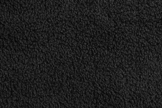 Black teddy bear texture fabric background