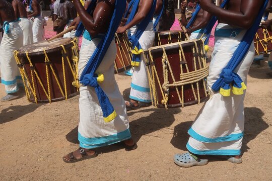 Sinkarimelam or chendamelam, Chenda is a traditional percussion instrument originating from Kerala, India, used in temple rituals, classical dance forms like Kathakali, and other cultural festivities.