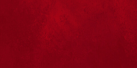 Fototapeta premium Vibrant red grunge texture background with dark mottled patterns, aged crimson paint effect, and abstract weathered wall