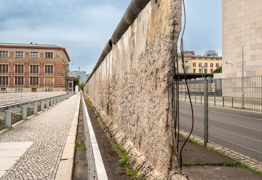 Berlin, germany, august 13, 2023. Berlin wall remnant on display, representing division and cold war history, located near the topography of terror building
