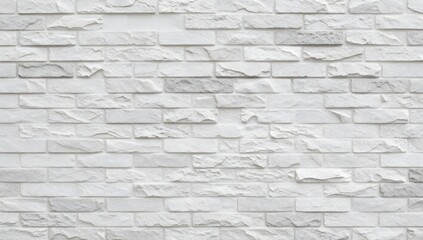 Fototapeta premium Monochromatic brick wall exhibits a subtle gradient in color and texture