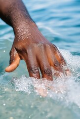 Fototapeta premium Reaching out to nature with a gentle touch of water