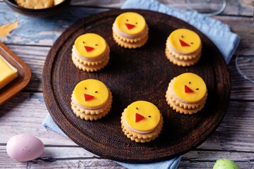 Ham sausage and cheese slices in the form of chick and crackers for Easter holidays