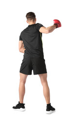Athletic man in red boxing gloves fighting on white background, back view