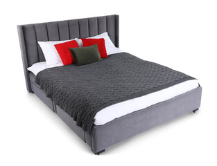 Fototapeta premium Large bed with grey blanket and red pillows isolated on white