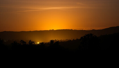 Fototapeta premium Calm radiant glow over jungle trees