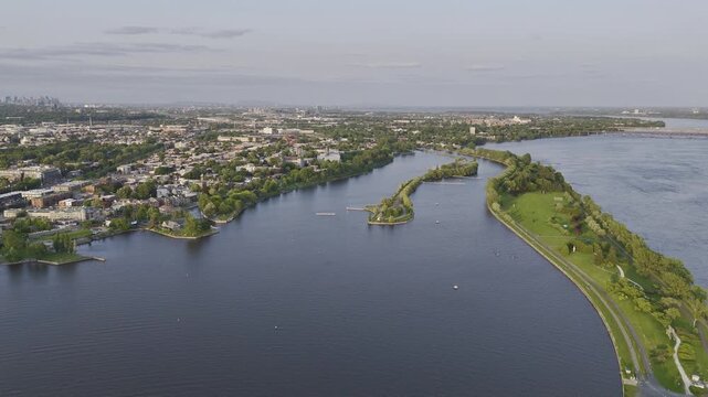 Aerial view of Rene-Levesque Park lighthouse peninsula in Lachine, Montreal along St Lawrence River at sunset. g.