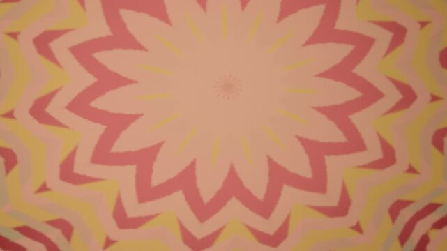 A colorful, abstract design with a yellow and pink center