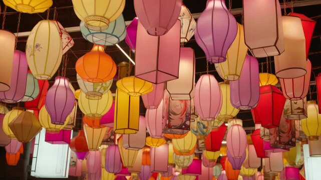 Beijing Spring Festival Night: Festive lanterns and Year of the Horse celebrations on Qianmen Street, featuring traditional colorful lanterns and poetic light displays