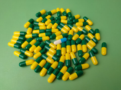 Yellow and green capsules, which are commonly associated with the medication&nbsp;Tramadol&nbsp;in 50 mg doses