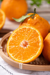 fresh ponkans tangerines on wooden table.