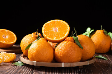 fresh ponkans tangerines on wooden table.