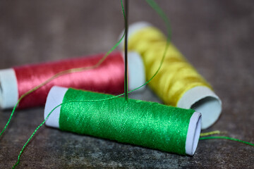 Colorful Sewing Thread Spools with Needle