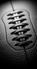 Close-up of black leather shoe laces.